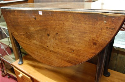 Lot 1218 - An early George III mahogany dropleaf dining...