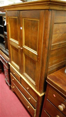 Lot 1223 - A contemporary hardwood compactum, having twin...