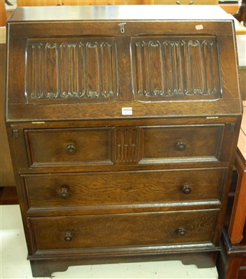 Lot 1233 - A contemporary linenfold moulded oak...