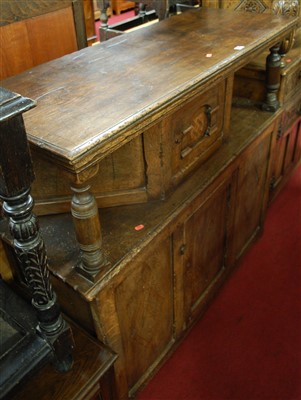 Lot 1251 - A 17th century style joined oak court cupboard...