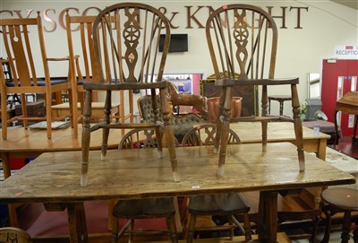 Lot 1255 - A joined oak planked top trestle end refectory...