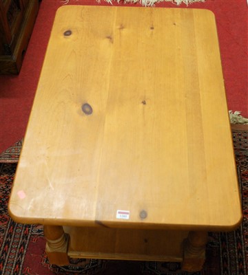 Lot 1285 - A modern pine round cornered two-tier coffee...