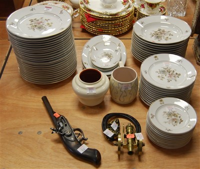 Lot 104 - A modern Portuguese part dinner service, on a...
