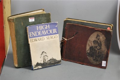 Lot 105 - An early 20th century photograph album,...