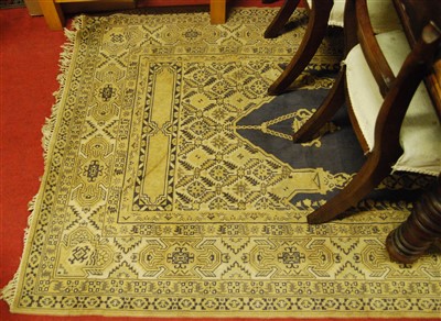 Lot 1304 - A Persian woollen buff ground prayer rug,...