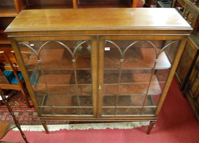Lot 1305 - An early 20th century mahogany double door...