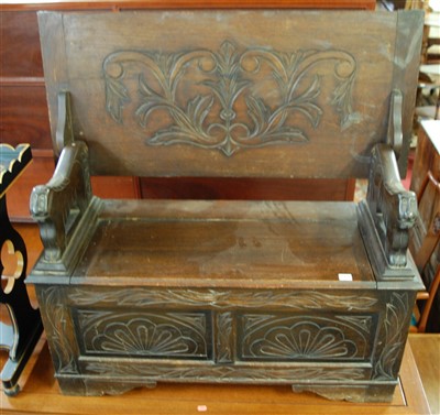 Lot 1310 - An early 20th century line carved two panelled...
