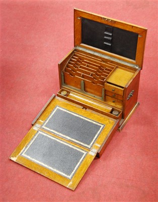 Lot 140 - An Edwardian oak stationery cabinet, having a...