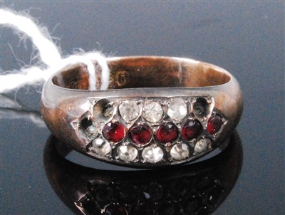 Lot 426 - A 9ct gold garnet and CZ set dress ring 2.2g,...