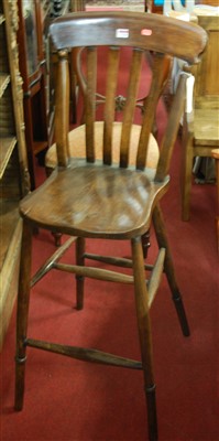 Lot 1330 - An early 20th century elm seat and beech...