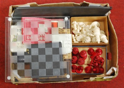 Lot 391 - A 19th century natural and red stained ivory...