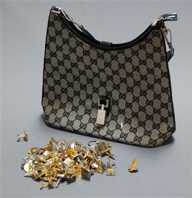 Lot 395 - A ladies Gucci embroidered hand bag and...