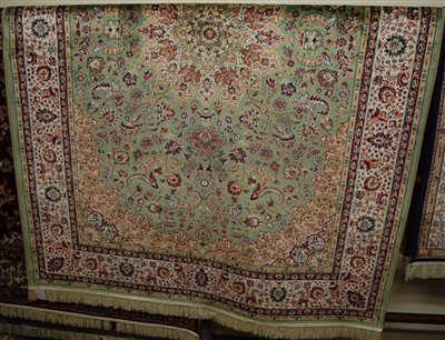 Lot 1144 - A machine-woven Persian kashan carpet, 230 x...
