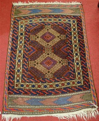 Lot 1140 - A Persian woollen prayer rug, having flatweave...