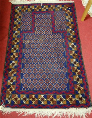Lot 1138 - A Persian woollen blue ground prayer rug, 133...