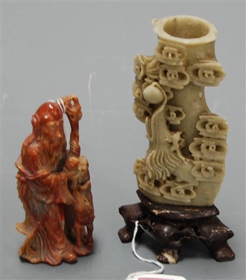 Lot 527 - A soapstone figure carved as a sage in...