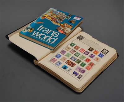 Lot 544 - An early 20th century leather bound stamp...