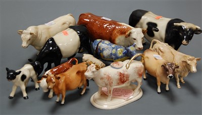 Lot 624 - A 19th century Staffordshire cow creamer with...