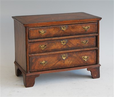 Lot 1257 - An early 20th century figured walnut and...