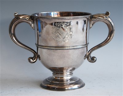 Lot 1062 - A George II silver twin handled loving cup,...