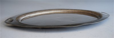 Lot 1067 - An Edwardian silver twin handled drinks tray,...