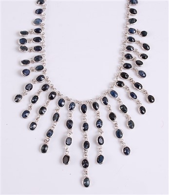 Lot 2540 - A white metal sapphire fringe necklet, the 99...