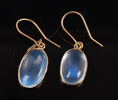Lot 2536 - A pair of yellow metal moonstone drop earrings,...