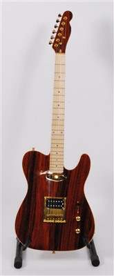 Lot 606 - A Santander telecaster electric guitar, in faux rosewood finish