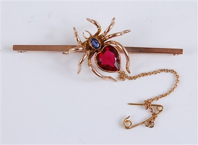 Lot 2548 - A yellow metal bar brooch in the form of a...