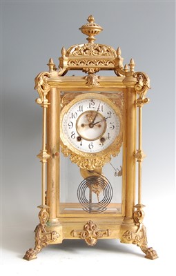 Lot 1370 - A late 19th century gilt metal four glass...