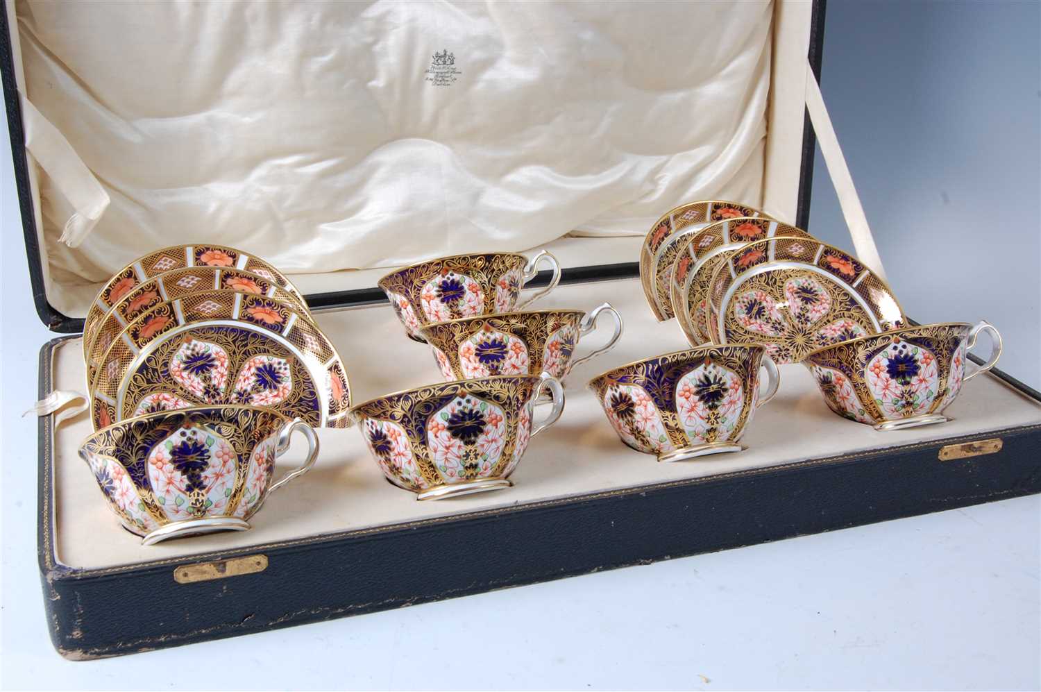 Lot 1028 - A cased set of six Royal Crown Derby teacups...