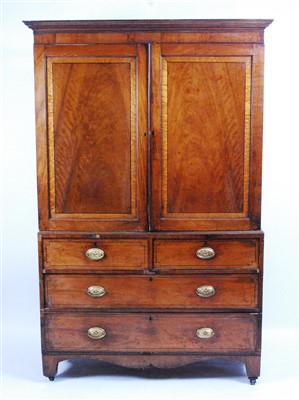 Lot 1401 - A Regency mahogany linenpress, having...