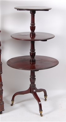 Lot 1460 - A late George III mahogany three-tier dumb...