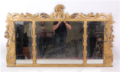 Lot 1494 - A 19th century carved giltwood chimney mirror,...