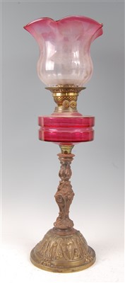 Lot 1267 - A Victorian brass and cast iron pedestal oil...