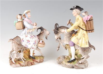 Lot 1017 - A pair of continental porcelain figures after...