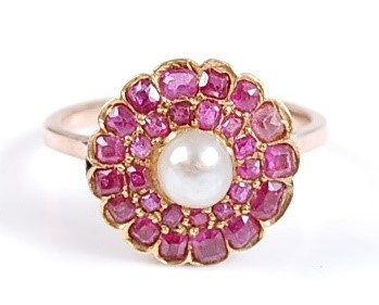 Lot 2605 - A yellow metal, ruby and pearl circular...