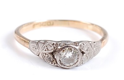 Lot 2603 - An 18ct yellow gold and platinum single stone...