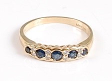 Lot 2568 - An 18ct yellow gold, sapphire and diamond half...
