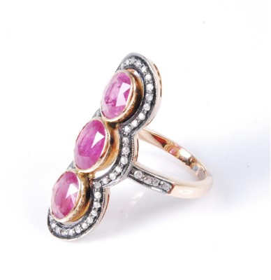 Lot 1181 - A yellow metal, ruby and diamond vertical...