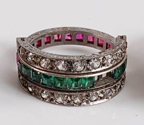 Lot 1185 - A white metal hinged ruby, green garnet and...