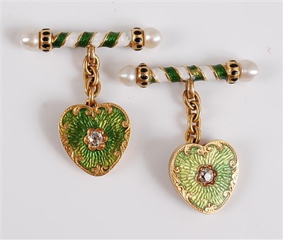 Lot 1191 - A pair of yellow metal cufflinks, each link...