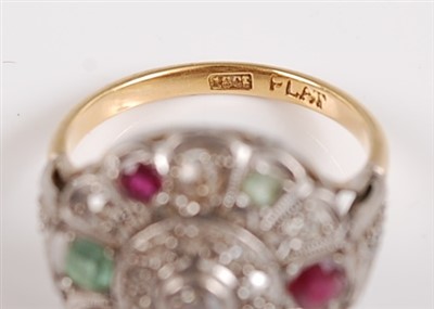 Lot 1193 - An 18ct and platinum diamond, ruby and emerald...