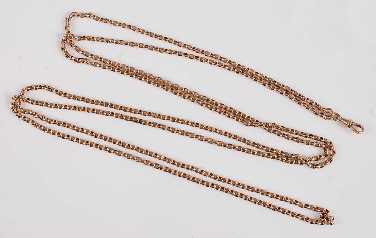 Lot 1197 - A yellow metal guard chain, oval belcher link...