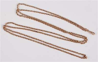 Lot 1197 - A yellow metal guard chain, oval belcher link...