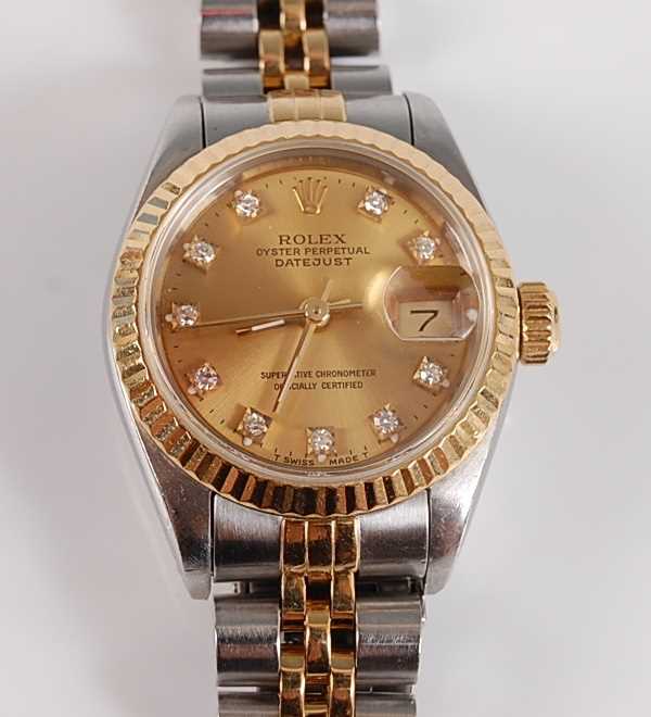 Lot 1247 - An Oyster steel and yellow lady's Rolex...