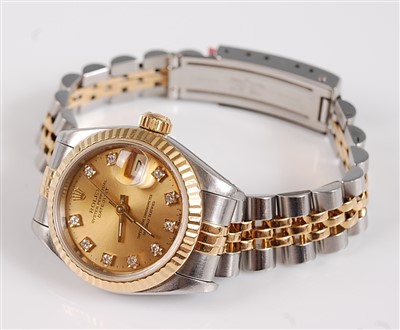 Lot 1247 - An Oyster steel and yellow lady's Rolex...