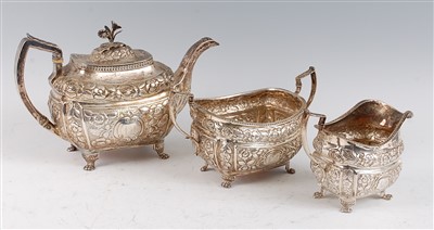 Lot 1080 - A late Georgian Irish silver three-piece tea...