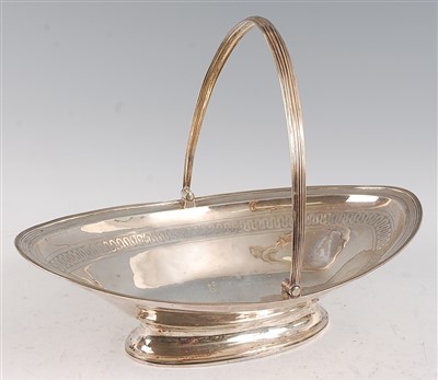 Lot 1090 - A large George III silver bread basket, of...