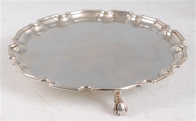 Lot 1113 - A modern silver card waiter, in the Georgian...
